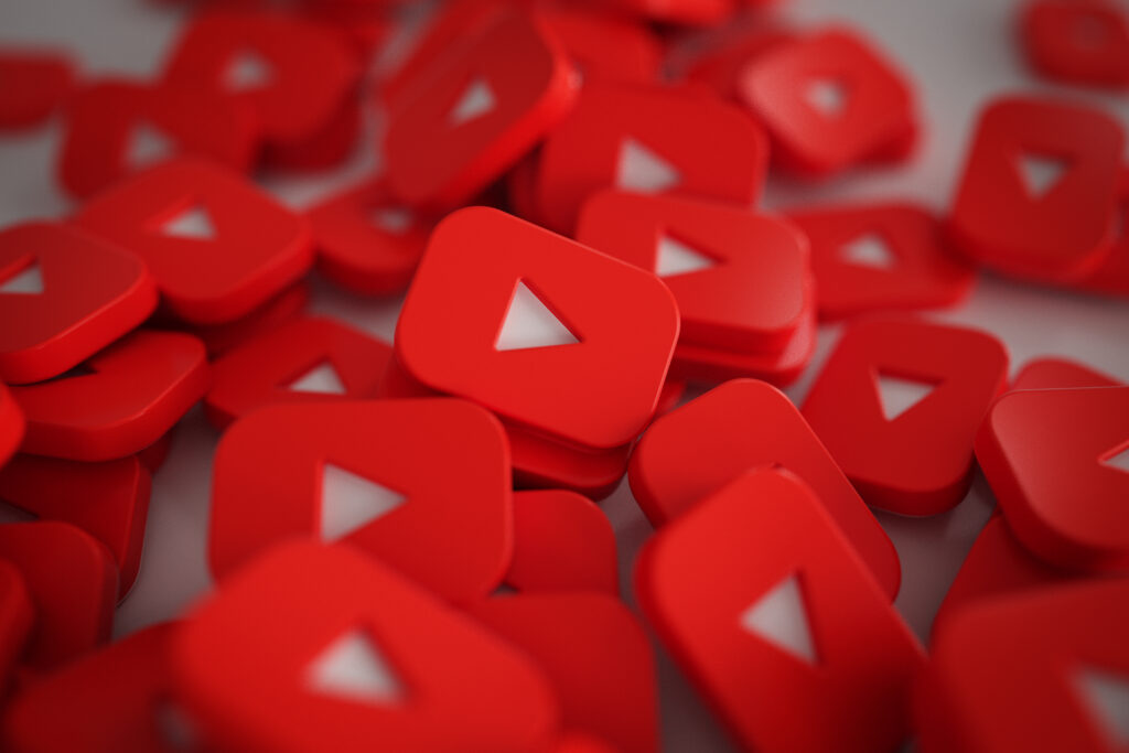 Pile of D Play Button Logos