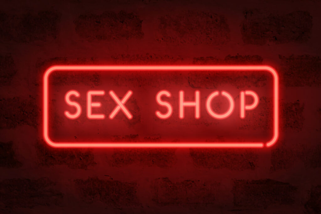 Sex shop neon Red sign on the wall Adult store